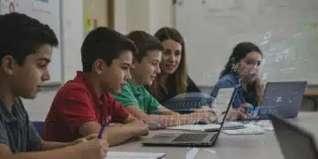 Diverse K-12 students and teachers engaging in a modern classroom, symbolizing federal education policy impact.