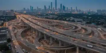 Massive highway interchange under construction in a US city, symbolizing major infrastructure investment.